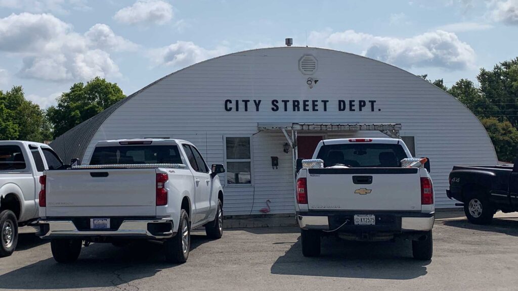 Campbellsville City Street Department building with work trucks parked in front.